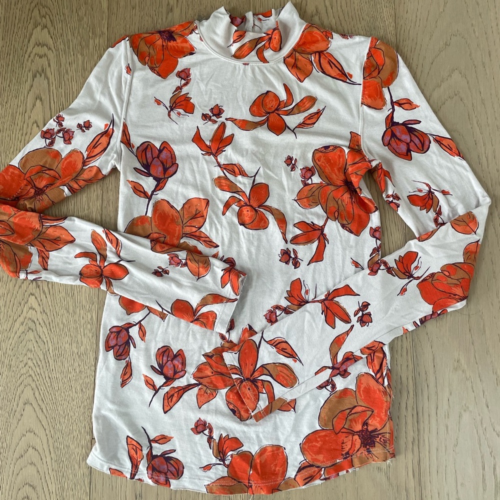 Beautiful floral free people top.